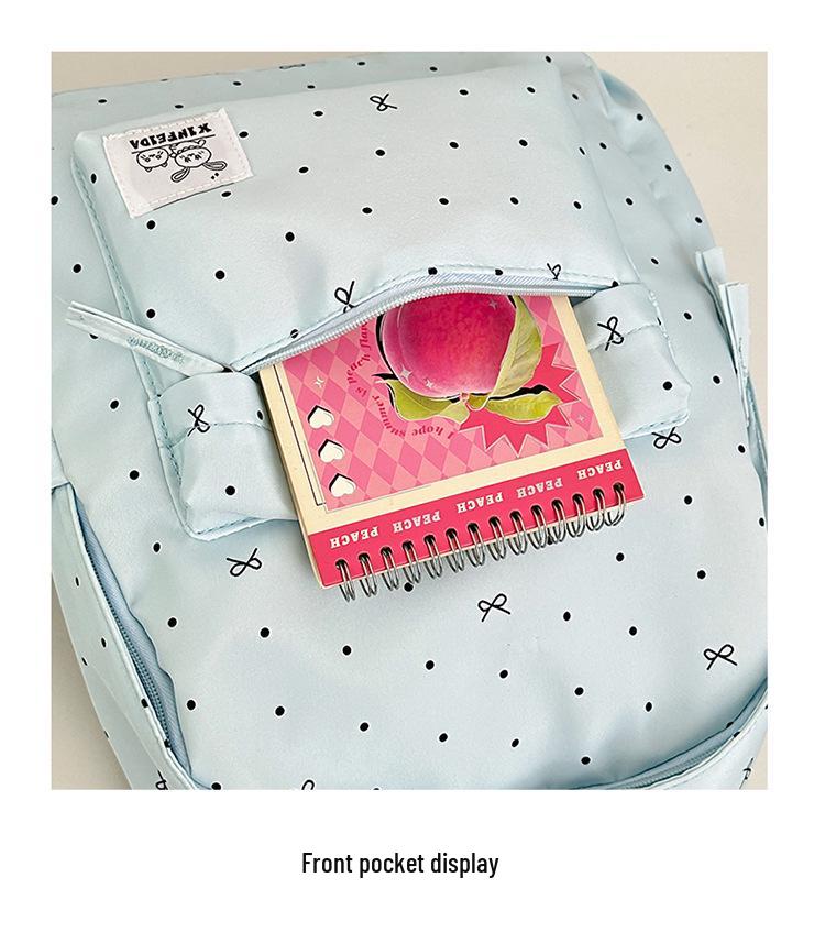Polka Dot Bow Backpack for Teen Girls: Stylish and Versatile Schoolbag for Middle and High School Students.