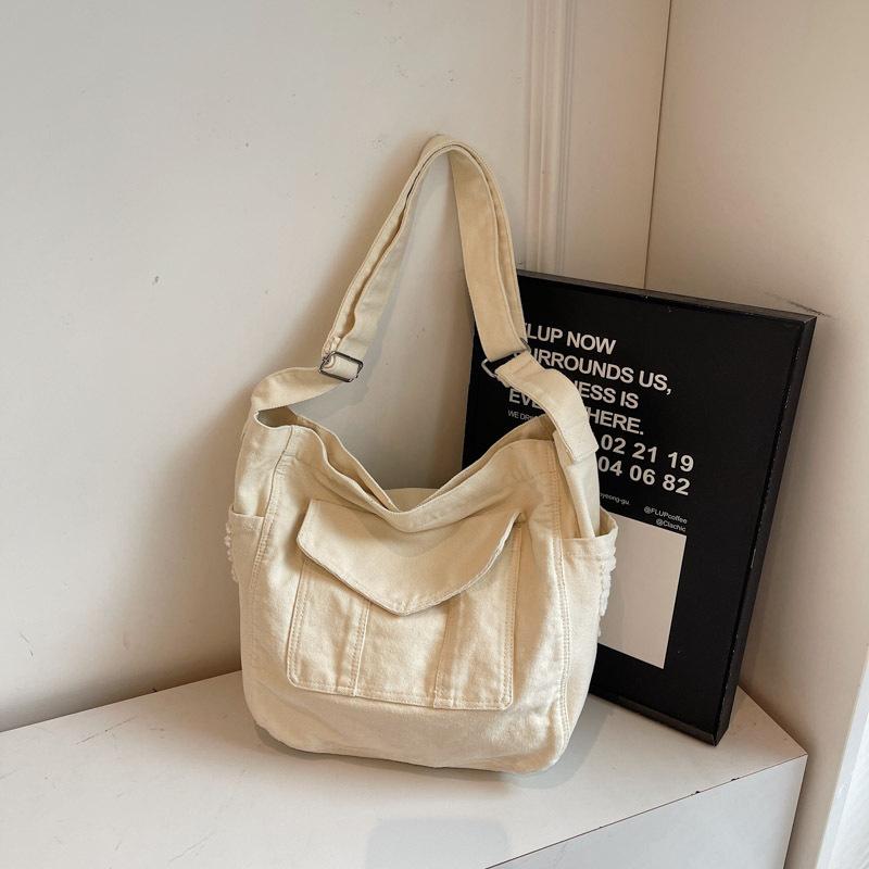 Fashion Texture Personalized Shoulder Bag Large Capacity Messenger Bag Commuter Student Tote Bag Simple Tutoring Bag