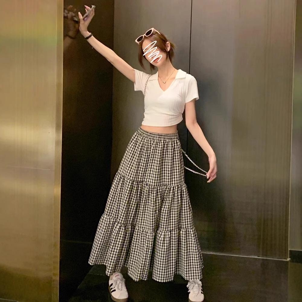 

Женская ретро клетчатая макси юбка А-силуэта с высокой талией - летняя миди длина с большим клешем One Size - Premium Version чёрный