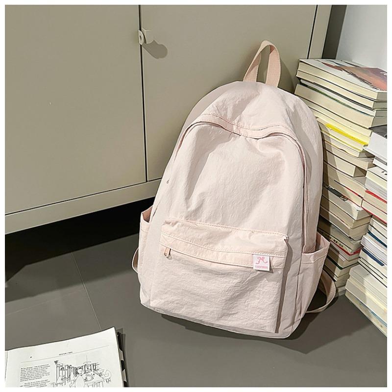 The new schoolbag is high-value, fresh and sweet, candy-colored backpack, lightweight and large-capacity backpack for junior high school students.