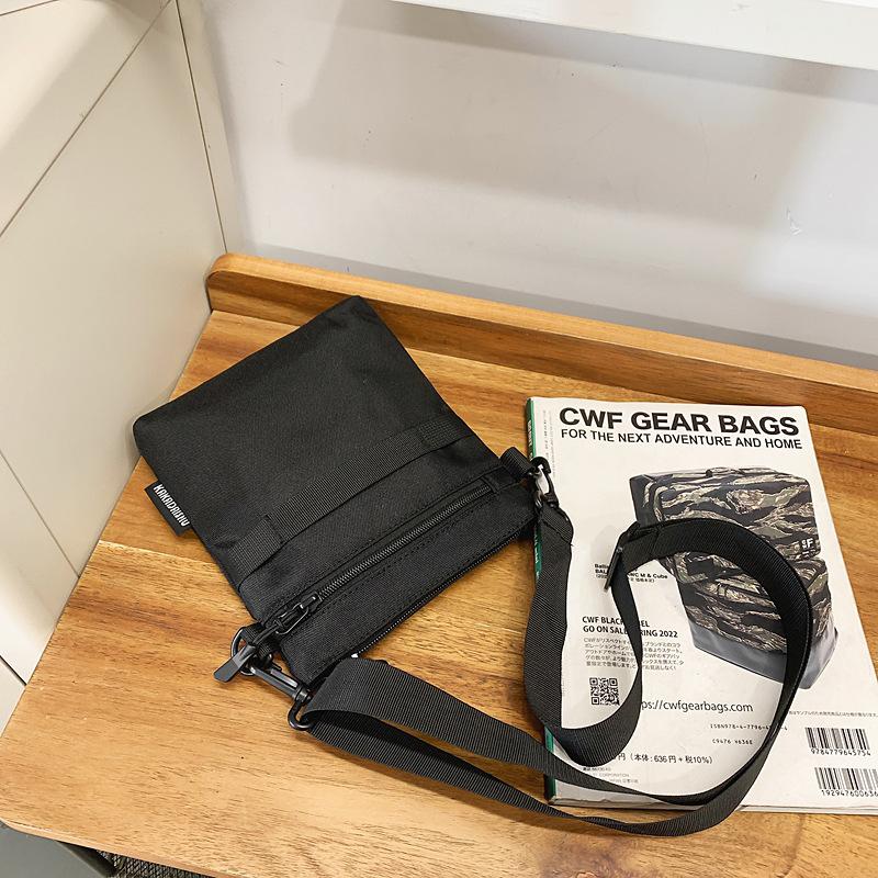 Korean casual trend messenger bag women's summer fashion sports portable Oxford cloth mobile phone bag versatile