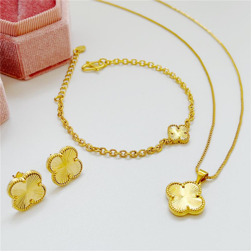 

Набор Института Темперамента Набор Песочный Золотой Цветок Кулон Ожерелье Серьги Браслет Трехкомпонентный Jet Set