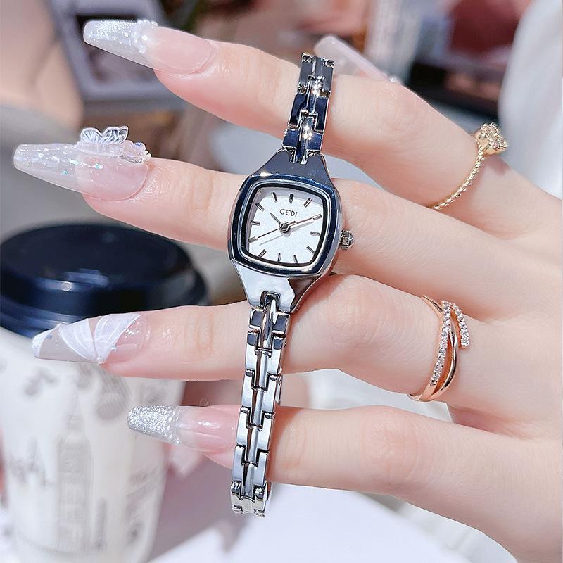 CQ451 Lässige und exquisite Damenuhr Armbanduhr schlicht und Legierung wasserdicht Quarzuhren für Frau