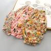 Pantaloni estivi per bambine con fiori, stampa casual, piedini retrattili, pantaloni da spiaggia traspiranti e freschi per neonati e bambini