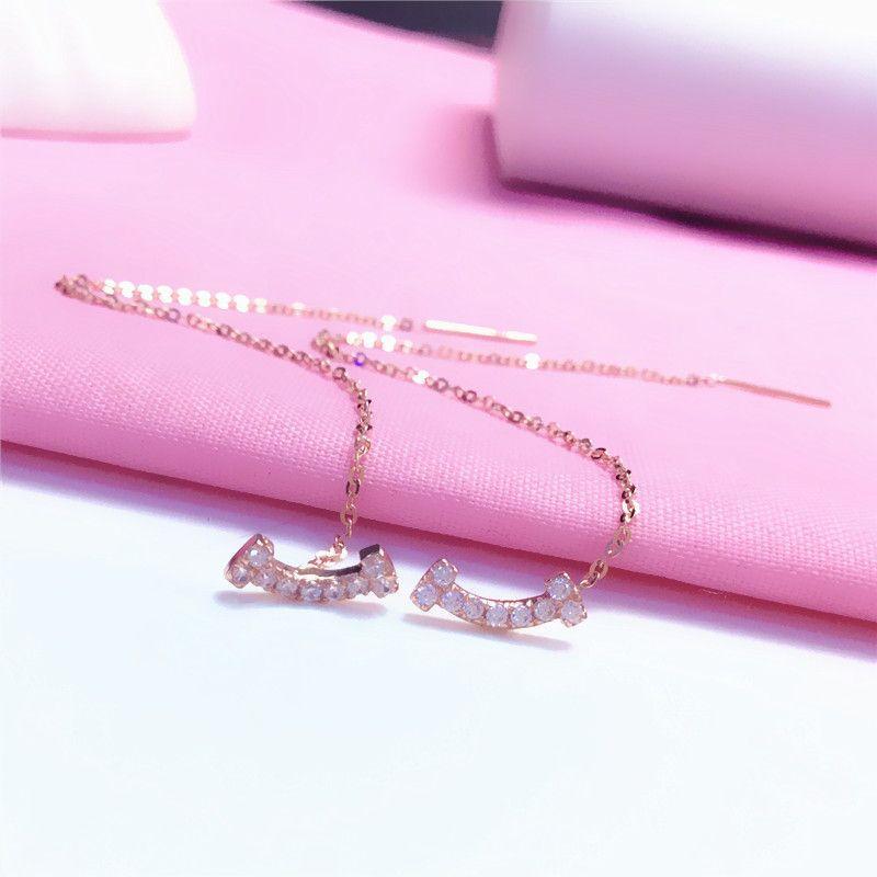 Exquisite Russian Purple Gold Smiley Face Long Earphones Exquisite Simple Rose Gold Plated Foreign Gas Zircon Smile Earphones (rose gold plated pair)