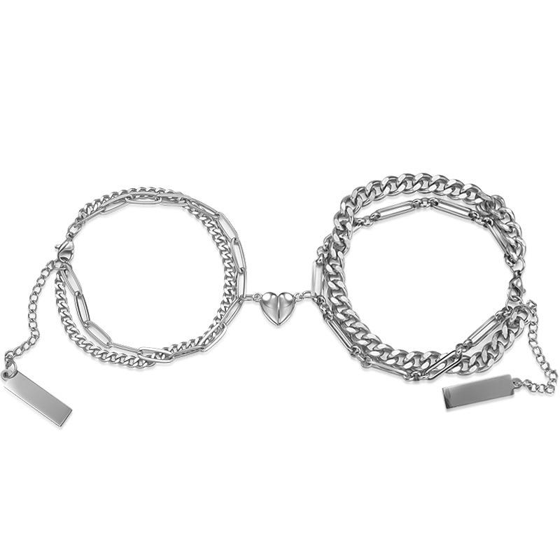 Heart-Fluttering Couple Bracelets: Trendy Double-Layer Stackable with Magnetic Heart Attraction for Women and Men.