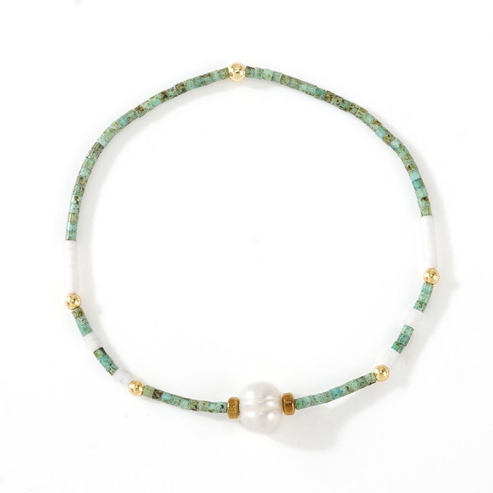 Elegant Freshwater Pearl & Turquoise Bracelet: Fashionable, Versatile Hand Jewelry with a Unique Design.