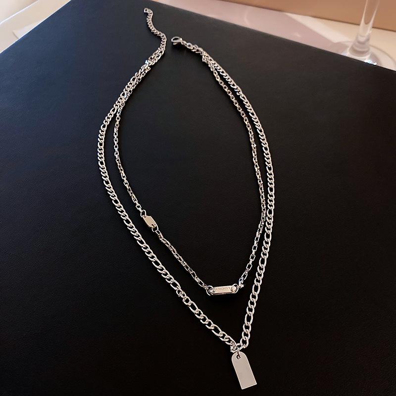 Titanium Steel Black Heart Pendant Necklace - High-End Niche Design Sweater Chain