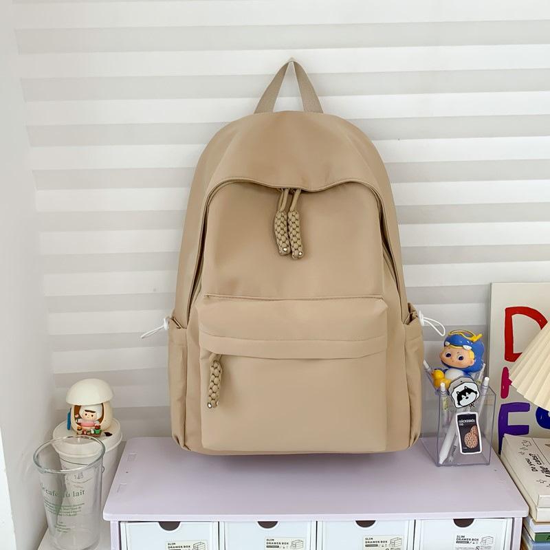 Schoolbag simple solid color schoolbag female Japanese large-capacity backpack junior high school student college student lightweight backpack 