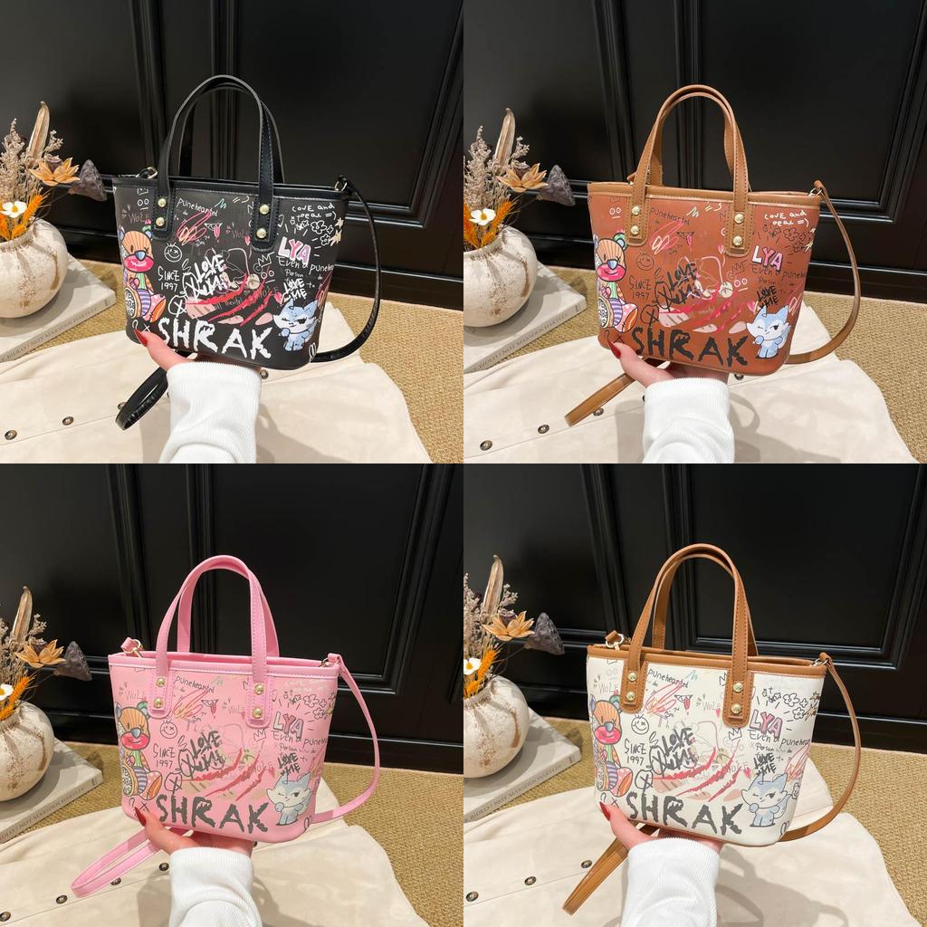 Große Eimer-Tasche aus PU für Damen mit Cartoon-Graffiti-Design, lässiger Streetstyle