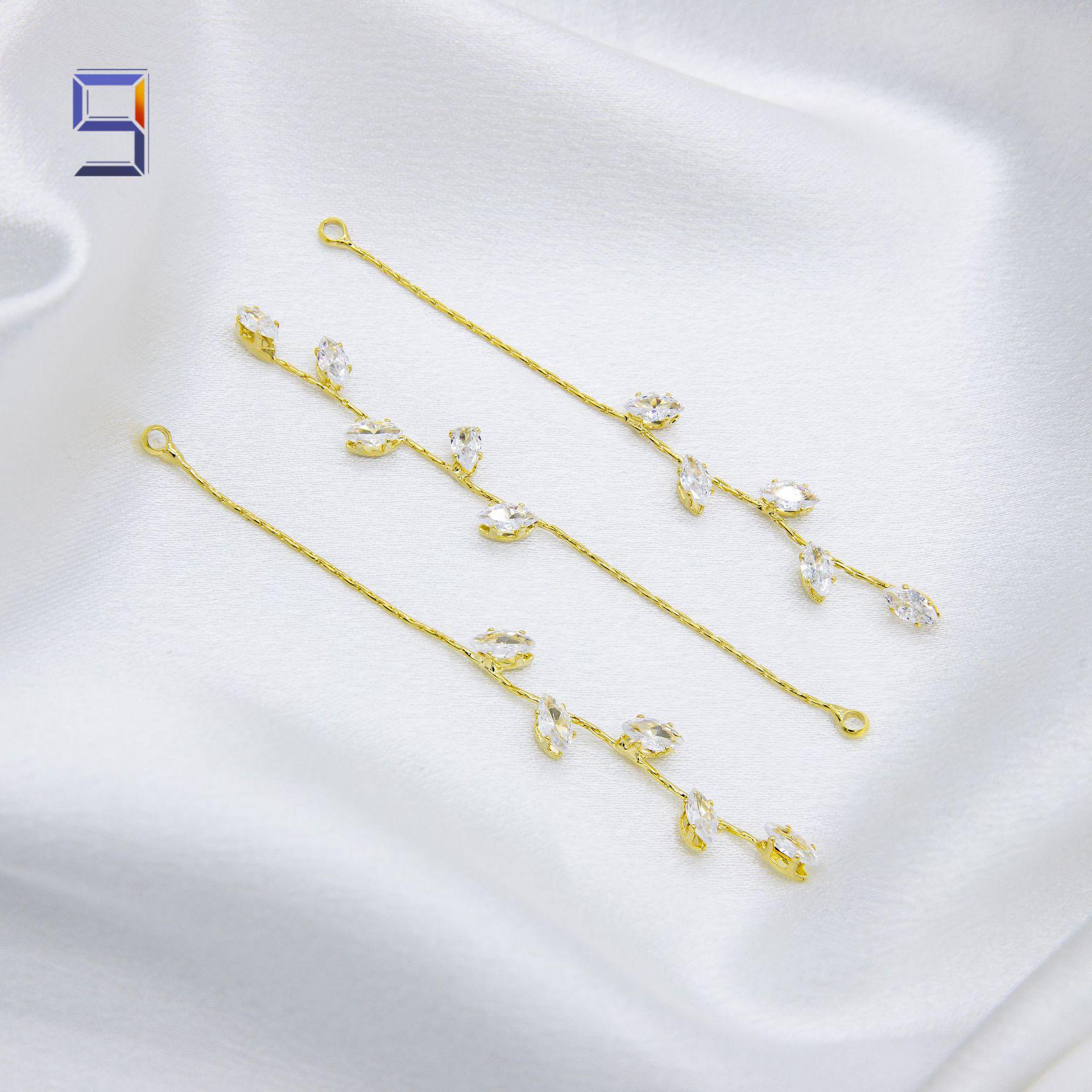 Copper-Plated 18K Gold Leaf Earrings with Rhinestone Tassels and Cubic Zirconia Accents