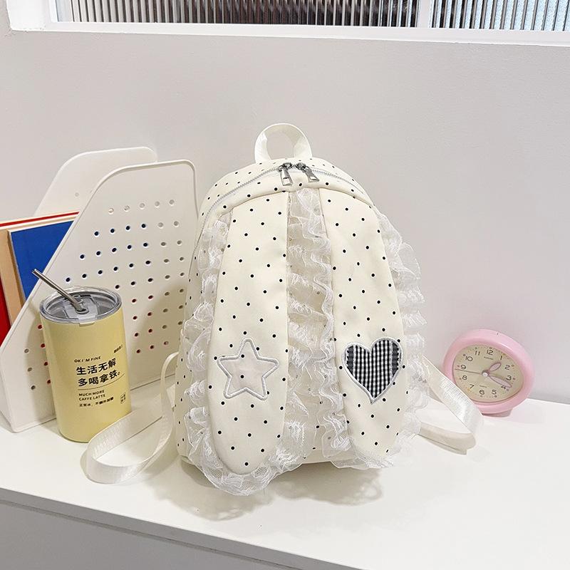 Schoolbag Korean version of sweet girl polka dot lace backpack new lop-eared rabbit trend high value travel foreign style backpack