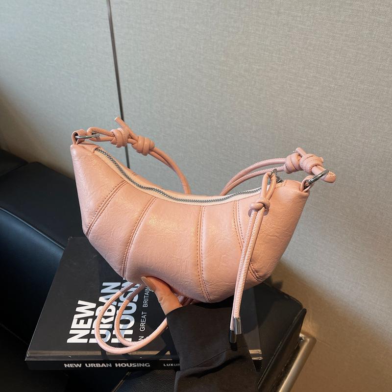 

Нишевая сумка женская новая весенне-летняя универсальная сумка-мессенджер сумка-пельмень популярная сумка-круассан розовый