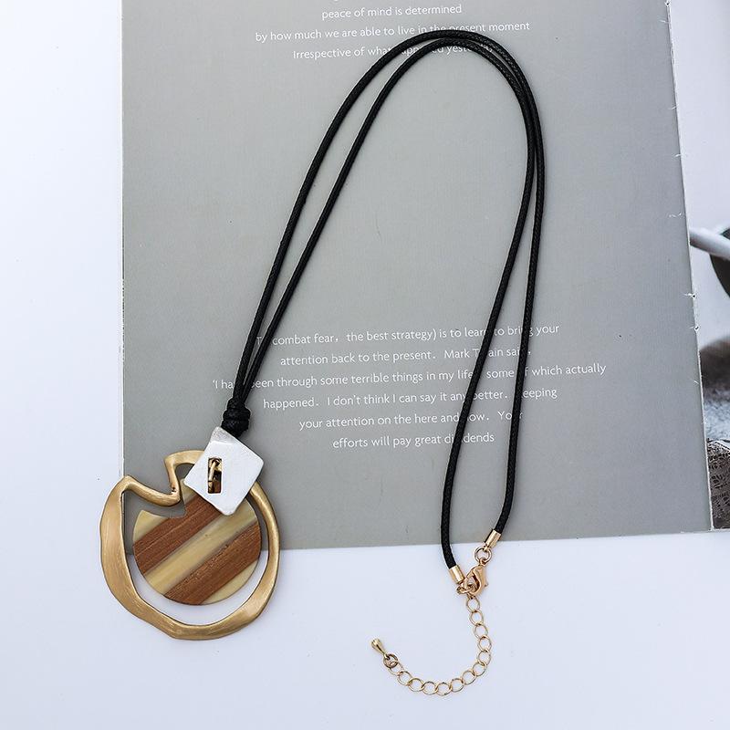 New women's necklace long high fashion retro personality trend pendant European and American