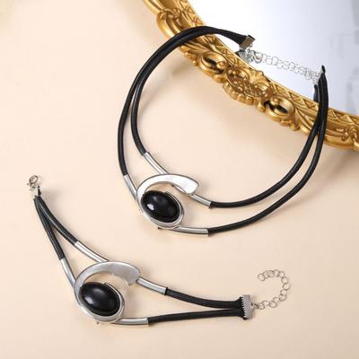 Conjunto de Joyería Bohemian de Acrílico con Ojo Ovalado de Caracol: Collar y Pulsera de Cordón de Cera para Mujer