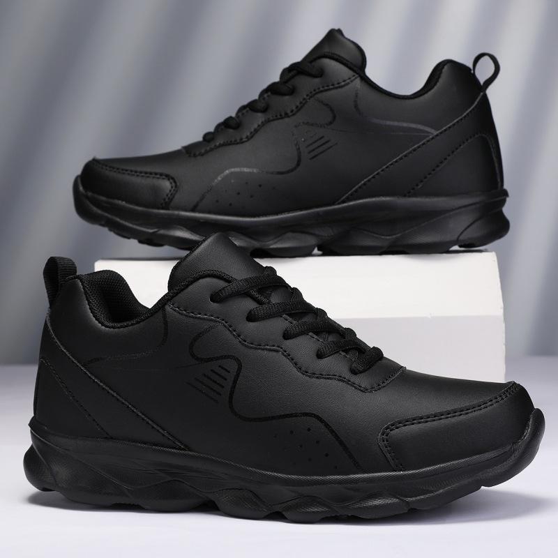 All-black sports shoes, new casual running shoes in autumn, leather shoes that are not tired after standing for a long time