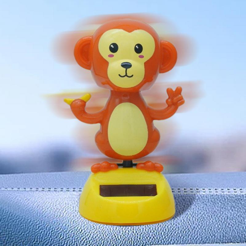 Solarbetriebenes Schaukelspielzeug, Cartoon-roter Affe, Auto-Puppendekor, starker Kleber auf der Rückseite, Auto-Innendekoration für Häuser und Autos