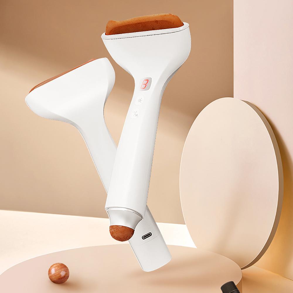 Aparat de masaj electric antirid pentru fata Bian Stone