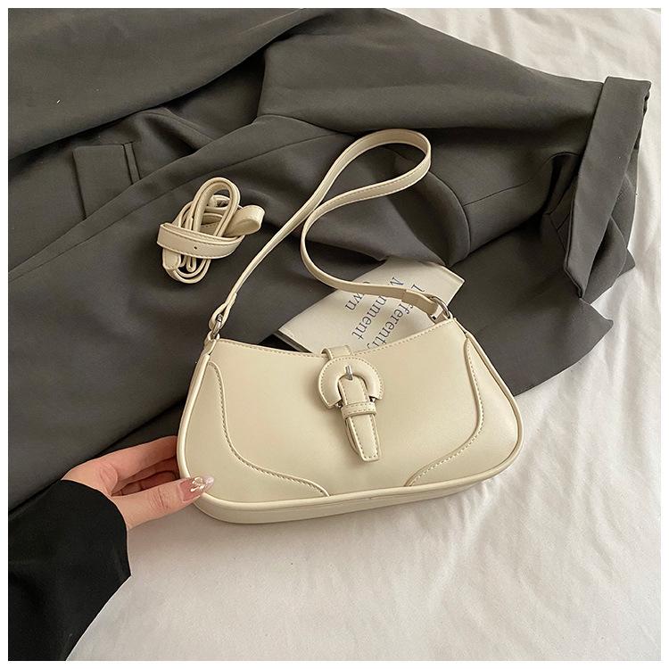 

Нишевая сумка подмышку женская 2025 новая популярная текстура контрастный цвет полумесяц женская сумка летняя мода плечевая сумка-мессенджер белый