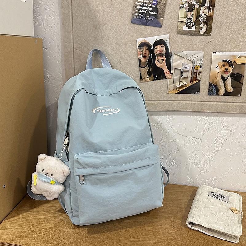 College style schoolbag for girls Junior high school students Simple large-capacity computer backpack Casual high school students Travel backpack tide