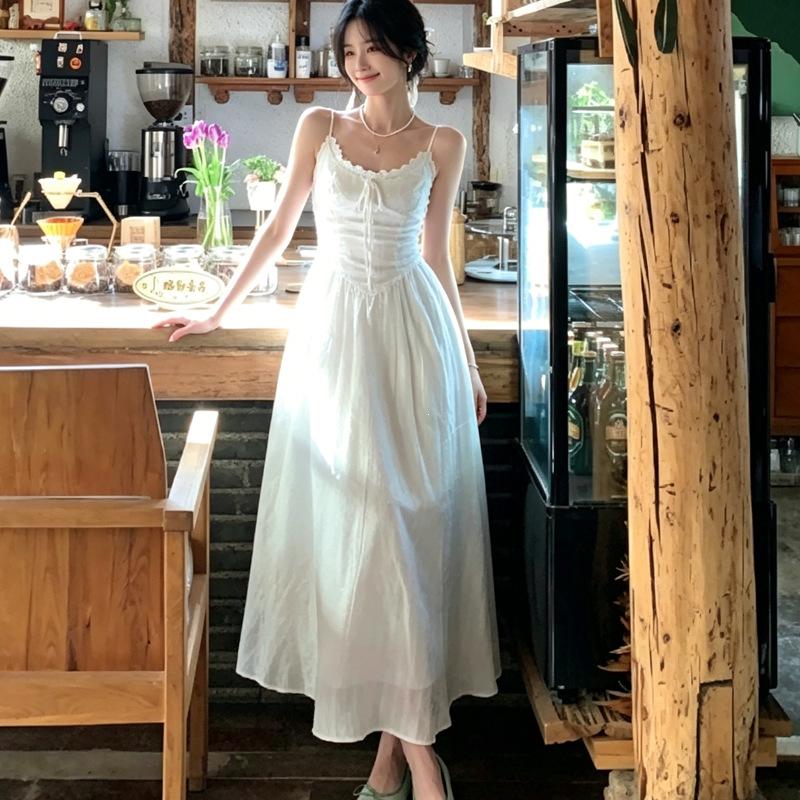 New unique beautiful gentle temperament long dress summer wear French white suspender dress women's summer