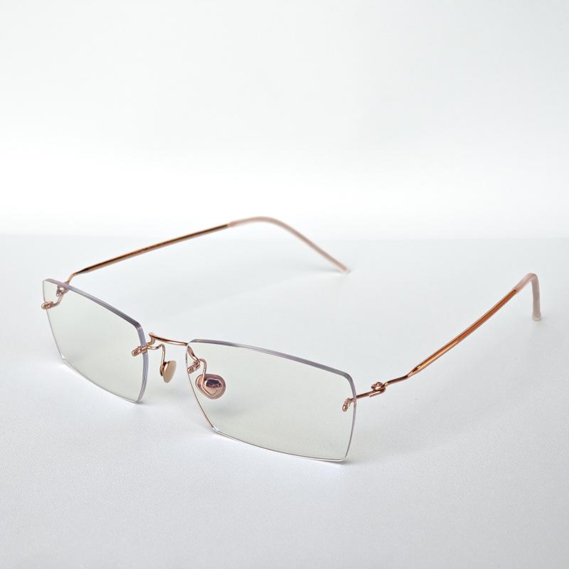 Rimless Titanium Alloy Luxury Glasses - Unisex Retro Light Frame