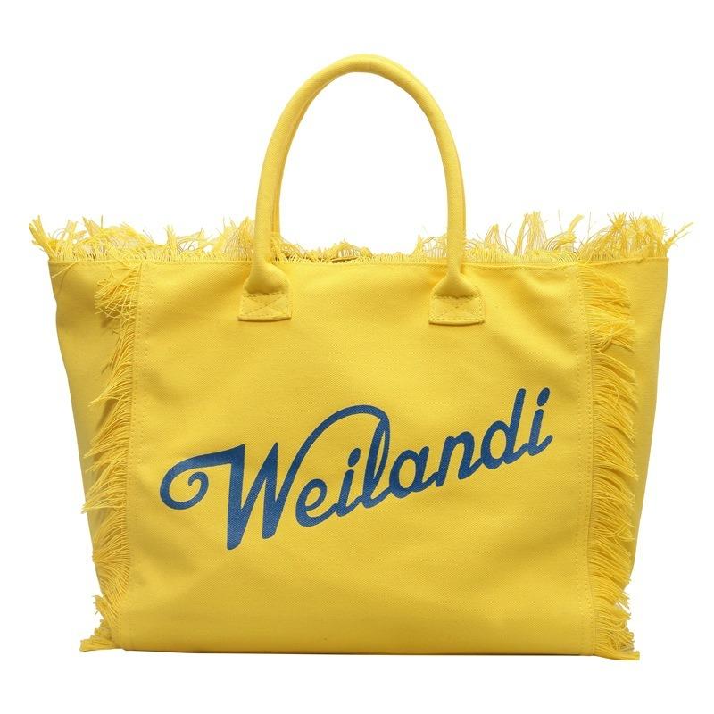 

Original tassel canvas tote bag women s new trend letter large capacity commuter shoulder bag жёлтый