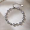Qiong Yao Six-Petal Flower Zirconia Bracelet: 18K Gold-Plated Stainless Steel, Heavy Design for Women