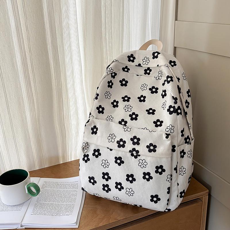 School bag female ins Japanese girls college wind small floral backpack Korean version Harajuku printed middle school student backpack female