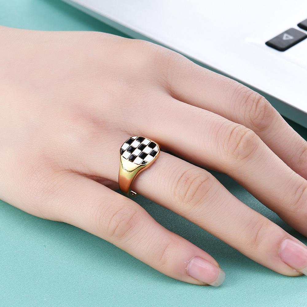 Elegant 18K Gold Stainless Steel Ring with Black and White Checkerboard Design for Women