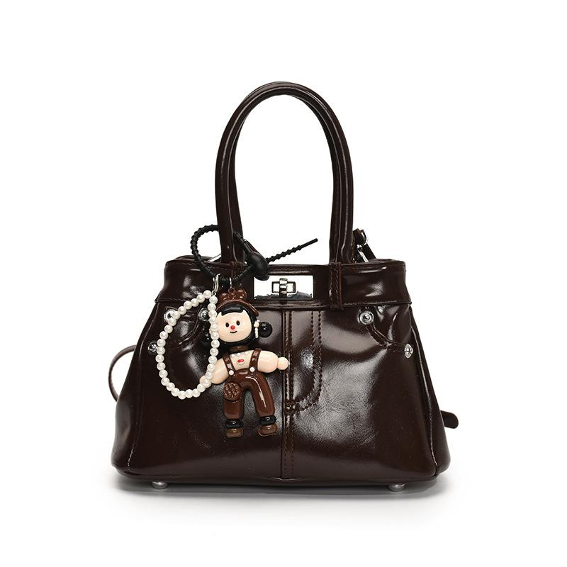 Spring and Summer New French Fashion Commuter Style Portable Bucket Bag Women's Versatile High-quality Foreign Leisure Messenger Bag