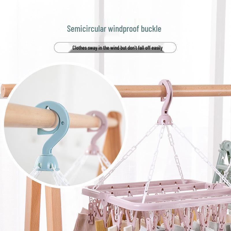 Retractable Indoor Multi-Clip Clothes Drying Rack for Socks, Underwear, and Travel.