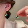 Elegant Green Earrings with Micro-inlays in The Form of A Four-leaf Clover Are A Trendy… More
