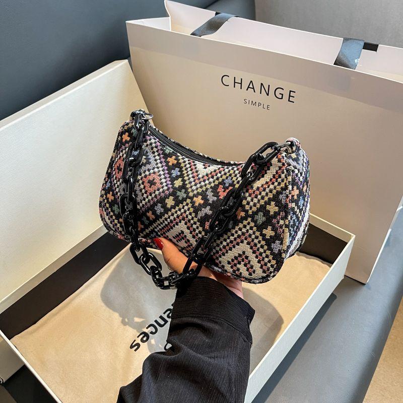 

This year s popular ethnic style baguette underarm bag women s 2025 spring and summer new versatile shoulder messenger bag canvas bag