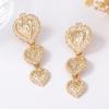 European and American Retro, Simple and Cold Style Alloy Concave-convex Hammer Texture Texture Heart-shaped Splicing Earrings for Women