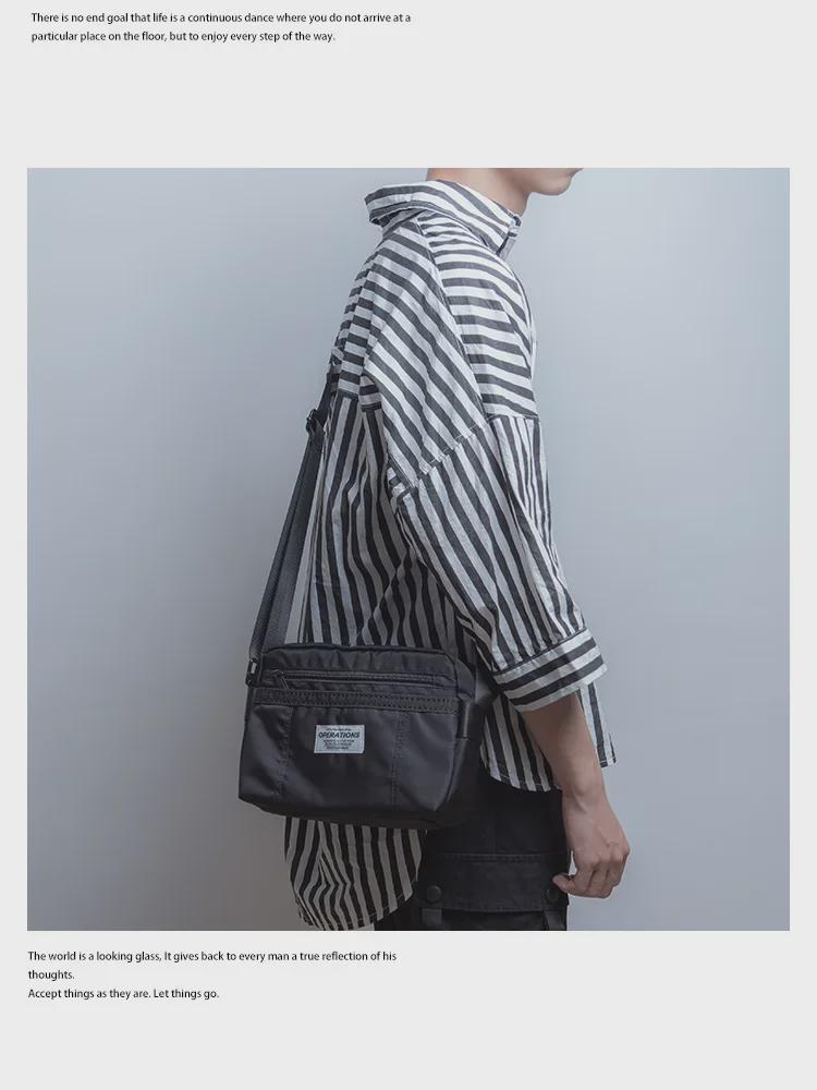 Herren Oxford Stoff Lässige Messenger Umhängetasche: Neuer Trend in der amerikanischen Street Fashion.