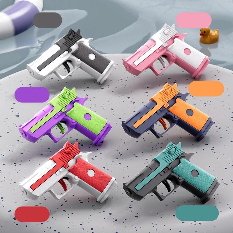 Mini Desert Eagle Pistola ad acqua meccanica a fuoco continuo Piccola pistola Estate All'aperto Spiaggia Giocattolo povero Spara pistola ad acqua per bambini