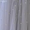 Wavy Edge Tulle Bridal Veil Mixed Size Scattered Pearl Hand Sewn Short Mid Length Wedding Veil With Comb For Strapless Gown Elopement Portrait Shoot