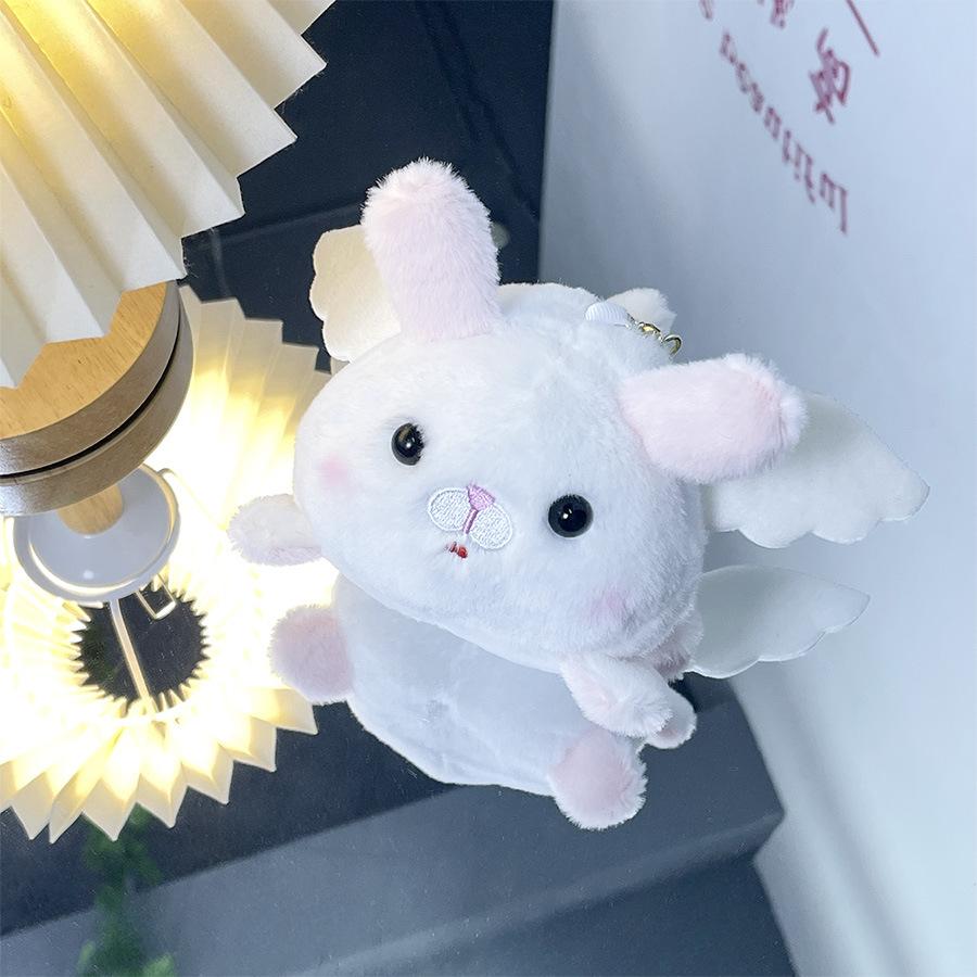 Niedliches Seil Schwanzwedeln Niedliches Haustier Tier Plüschpuppe Kreative Flügel Engel Fliegendes Schwein Puppe Geschenk