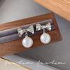 Sterling silver needle geometric splicing bow glass pearl earrings women's European and American style elegant and unique earrings tide