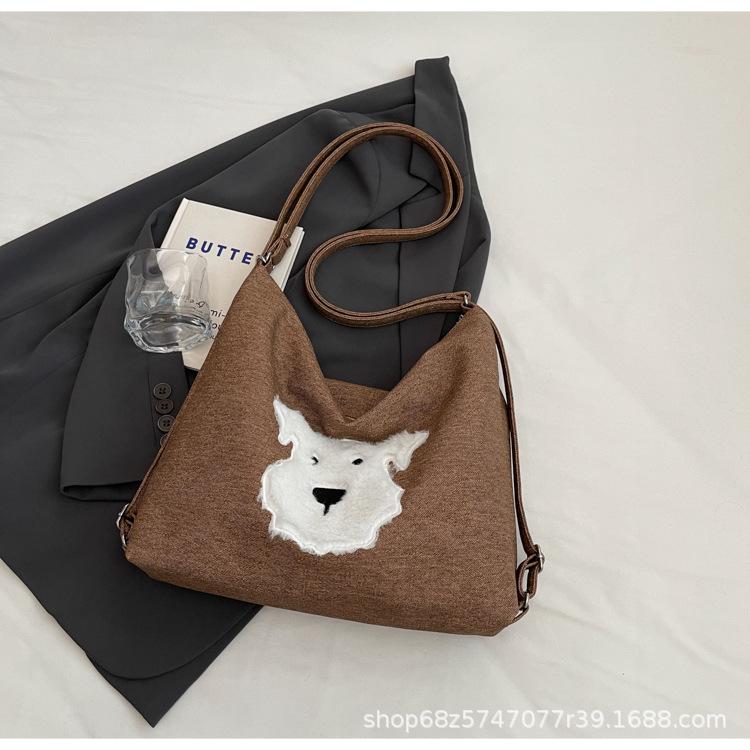 

2025 new retro large-capacity women s tote backpack new fashion casual fashion sense shoulder handbag