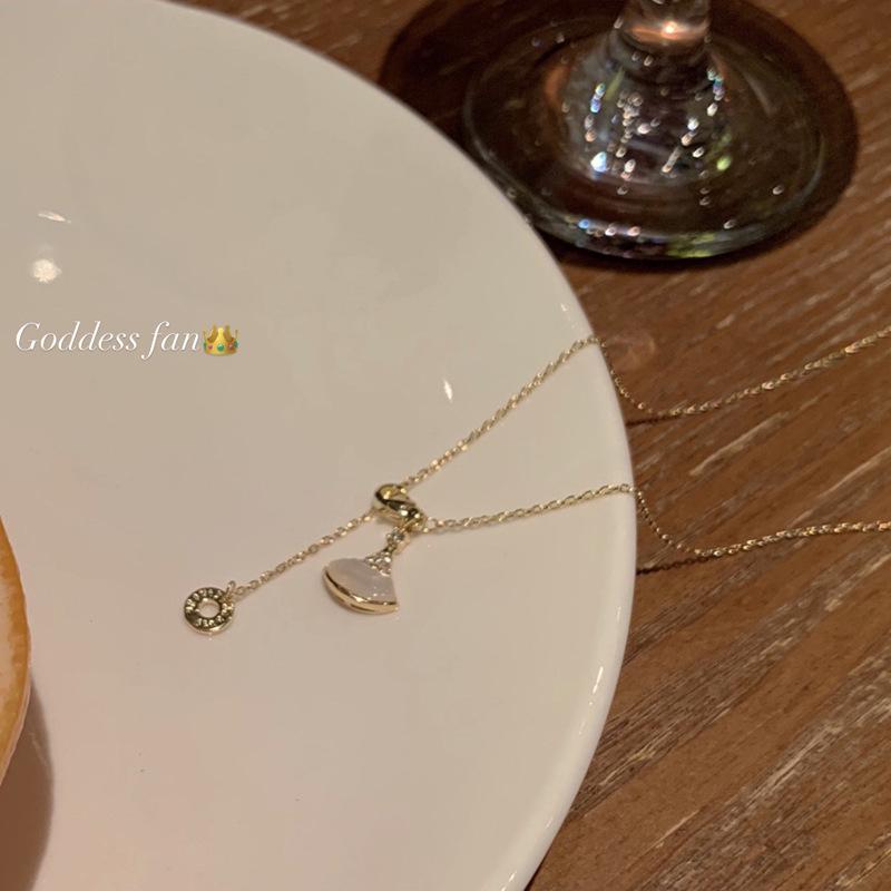 Elegant Korean Ginkgo Leaf Zircon Necklace Pendant - High-Grade, Niche Design Collarbone Jewelry.