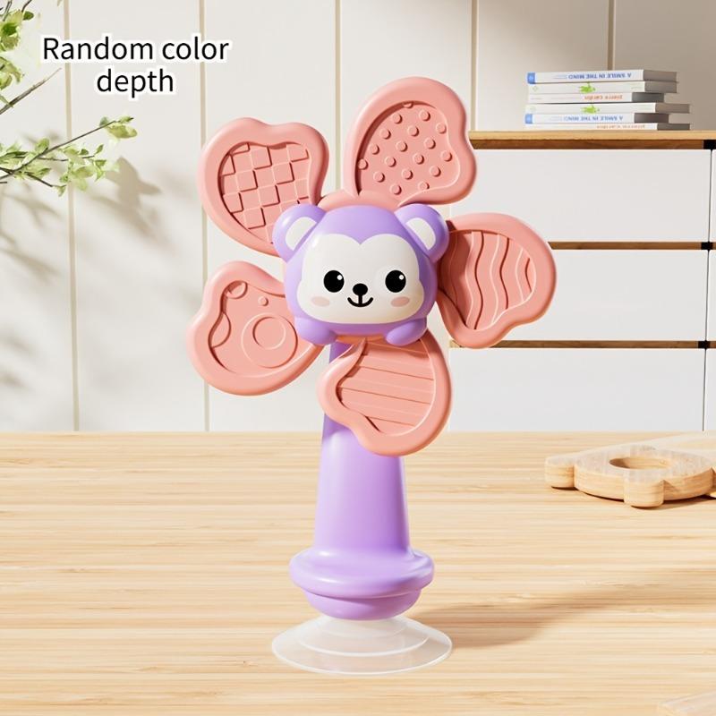 Baby Suction Cup Spinner, ABS sensory toy, portable for travel, helps develop motor and cognitive skills.