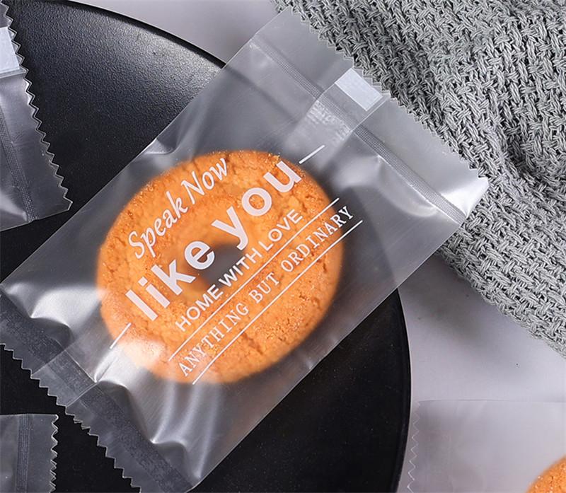 100Pcs Frosted Transparent English Letter Candy Nougat Milk Snowflake Crisp Machine Sealed Packaging Bags