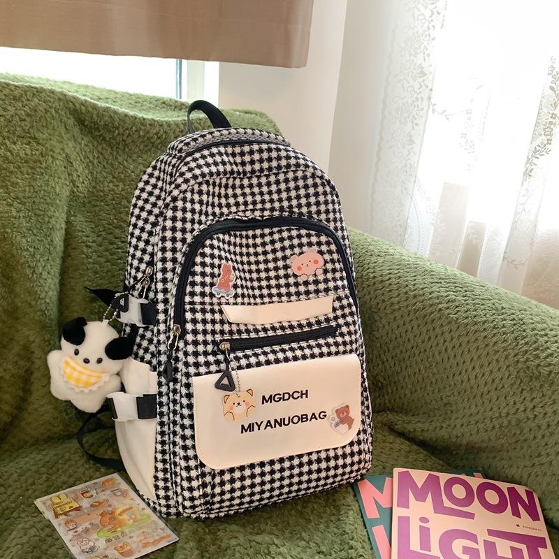 

High-value contrasting schoolbag female junior high school student plaid large-capacity travel backpack multi-layer storage student backpack single bag (without pendant)