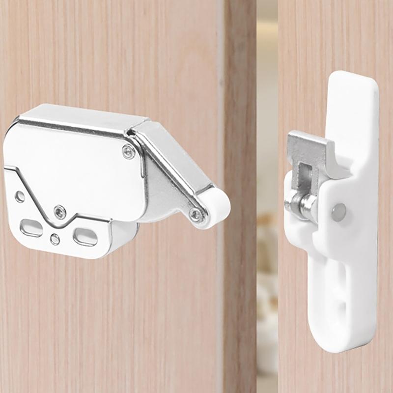 Skříňkové push-open západky Dotykové západky Záskokový zámek Vratný uzamykací mechanismus Záchytky typu push Otevírací záchytky Zámek