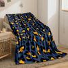A leopard print pattern with orange and black spots on a navy background. for all seasons blanket lunch break throw gift