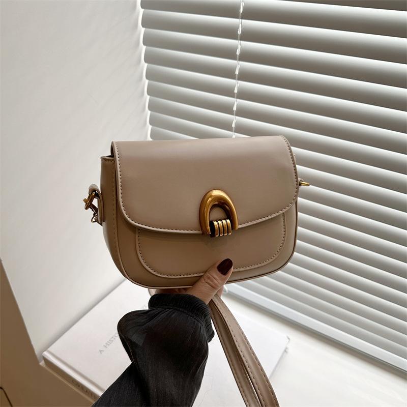 

Saddle bag women s 2025 new spring and summer versatile shoulder messenger bag women s niche design commuter women s bag small хаки