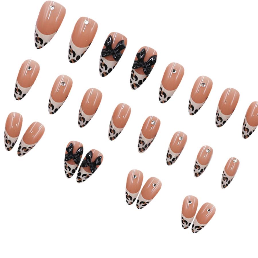 Spicy Leopard Print Black Bow Wear-on Nails: Long Almond Nude French Style, Cool & Sassy Nail Art