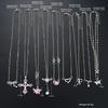 Set di 9 Collane con Ciondoli Eleganti in Zircone da Donna Moda Colore Rosa Croce Farfalla Cuore Fiocco Collane Gioielli da Festa Regalo